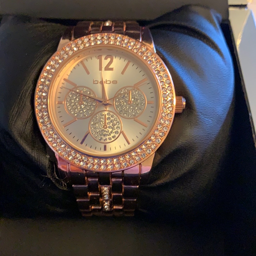 New Bebe goldtone watch